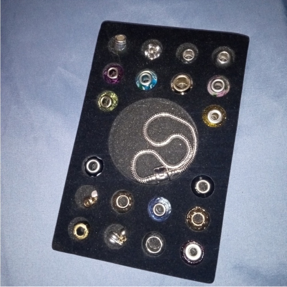 Stylish Silver Charm Bracelet with Assorted Beads